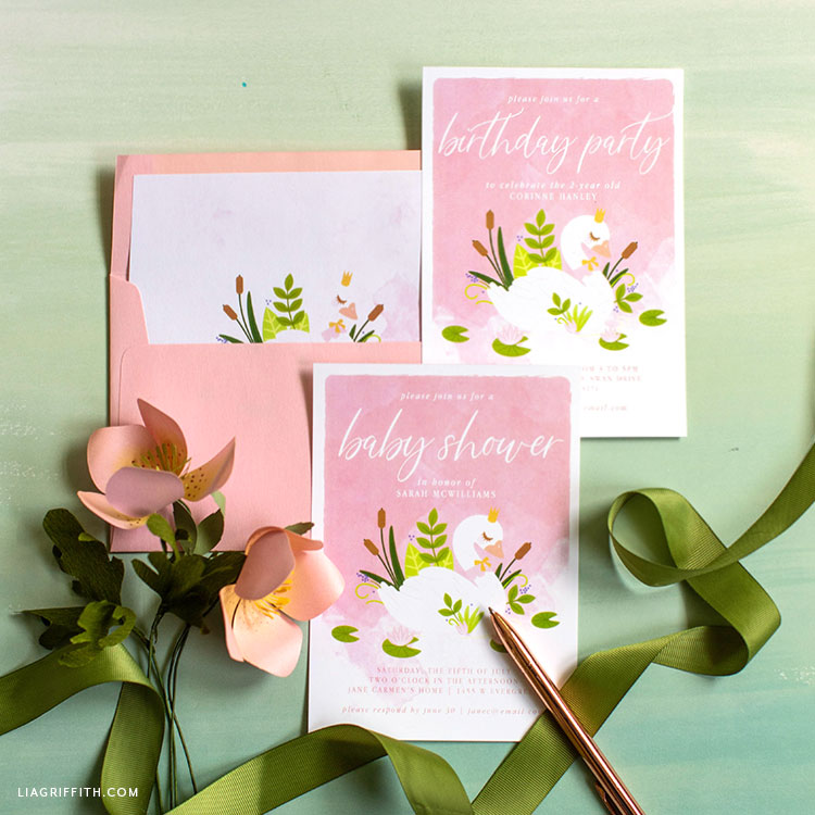 swan baby shower invitation and birthday party invitation with envelope, paper flowers, and green ribbon